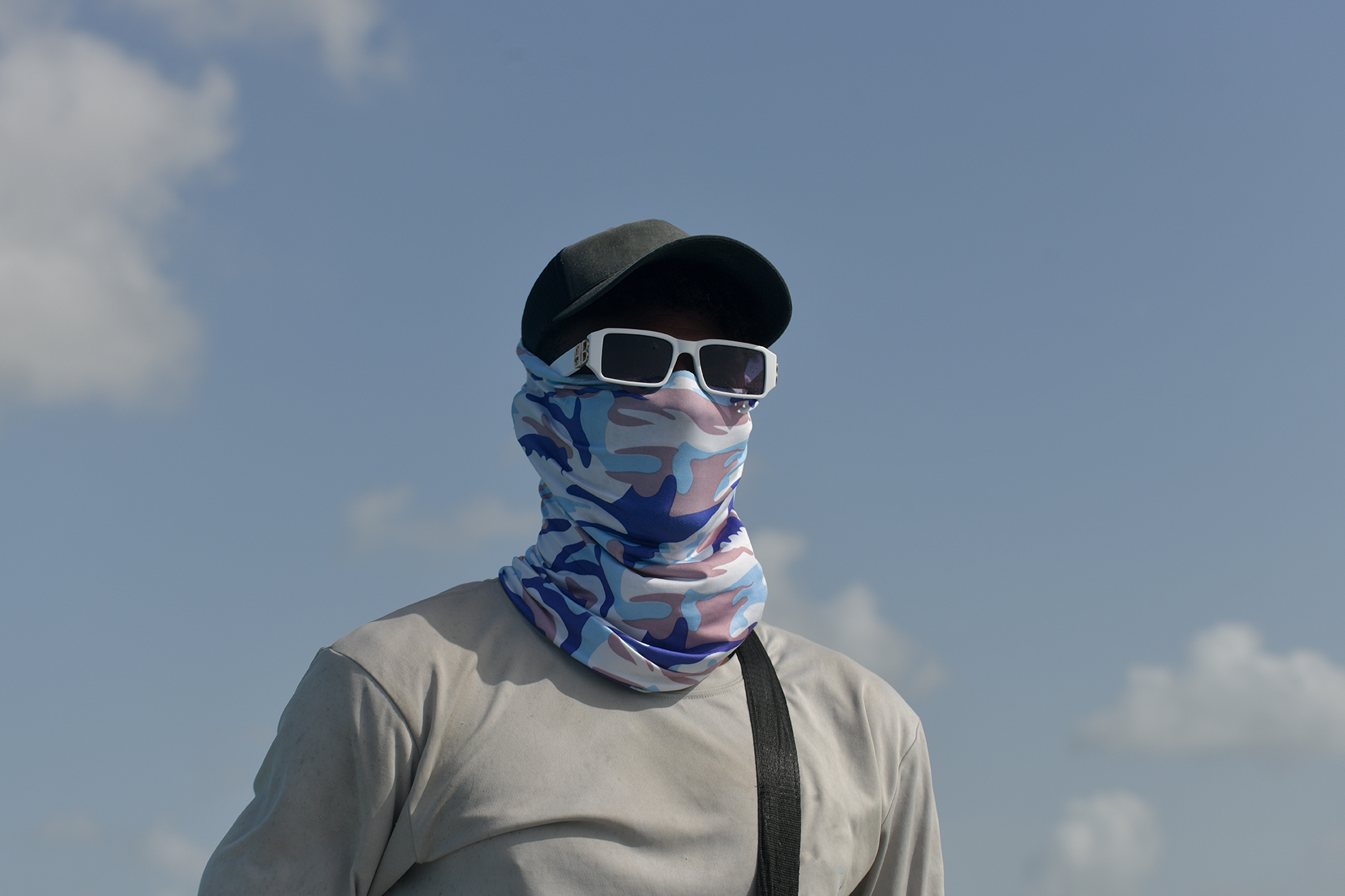 Man protecting himself from the sun.