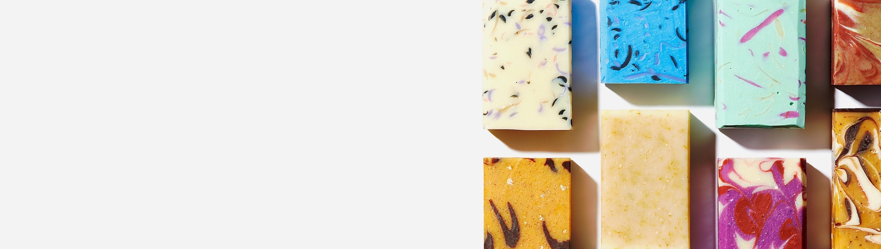 Colorful bars of soap on a white background.